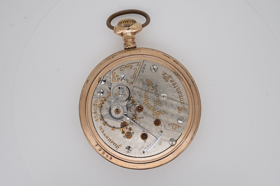 An American gold plated L.H. Doll, Calgery, N.W.J. open faced keyless pocket watch, with Arabic dial and subsidiary seconds, case diameter 53mm. Condition - poor